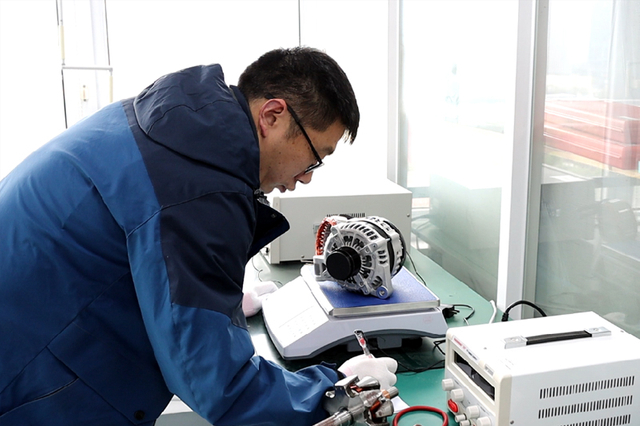 Automotive Alternator Quality Inspection by Factory Technician